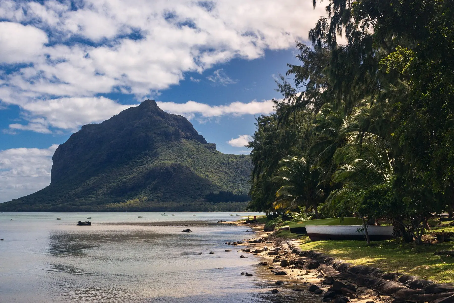 Le Morne Brabant rising above a calm lagoon in Mauritius