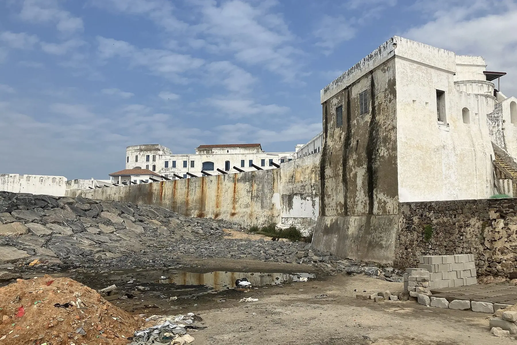 The whitewashed walls of Cape Coast Castle on the coast of Ghana